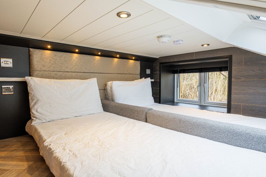 The mezzanine bedroom in a Deluxe Den at Silverdale